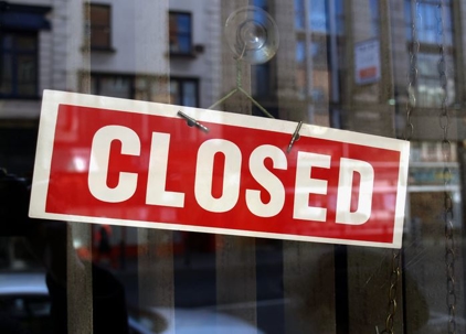 closed sign on window